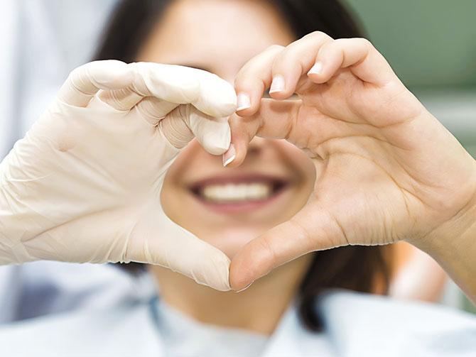 Making heart shape with hands